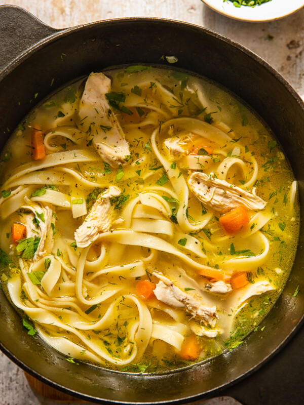 top down view of chicken noodle soup in a pot