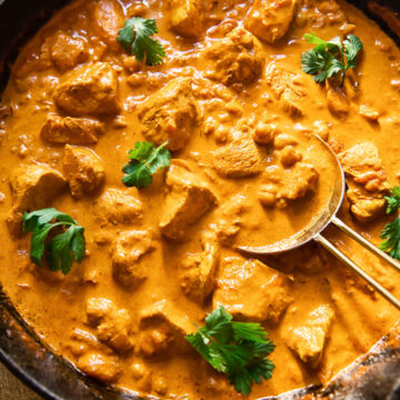 top down view of chicken curry in a pan