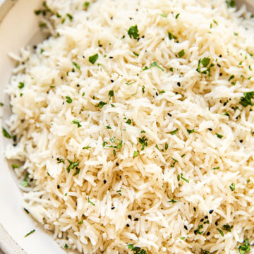 rice sprinkled with fresh cilantro in a bowl