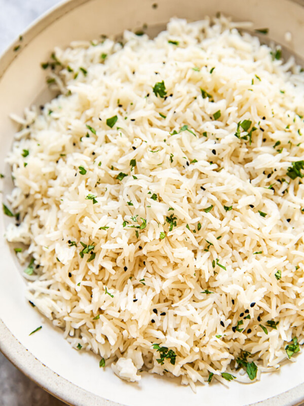 rice sprinkled with fresh cilantro in a bowl