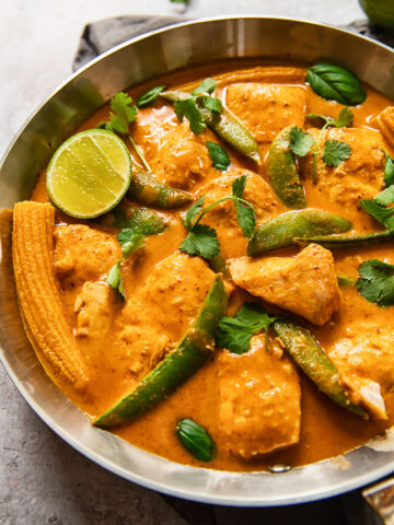 fish curry in a stainless steel pan