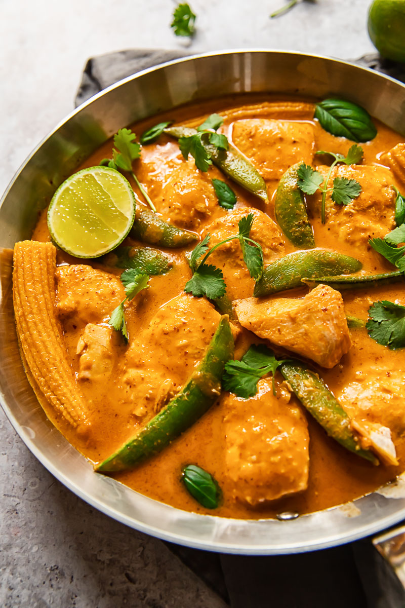 fish curry in a stainless steel pan