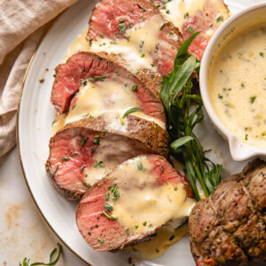 slice beef filet with sauce over it