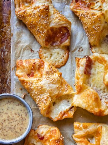 cheese turnovers on a baking sheet