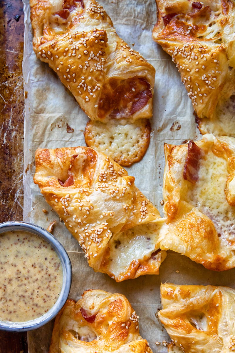 cheese turnovers on a baking sheet