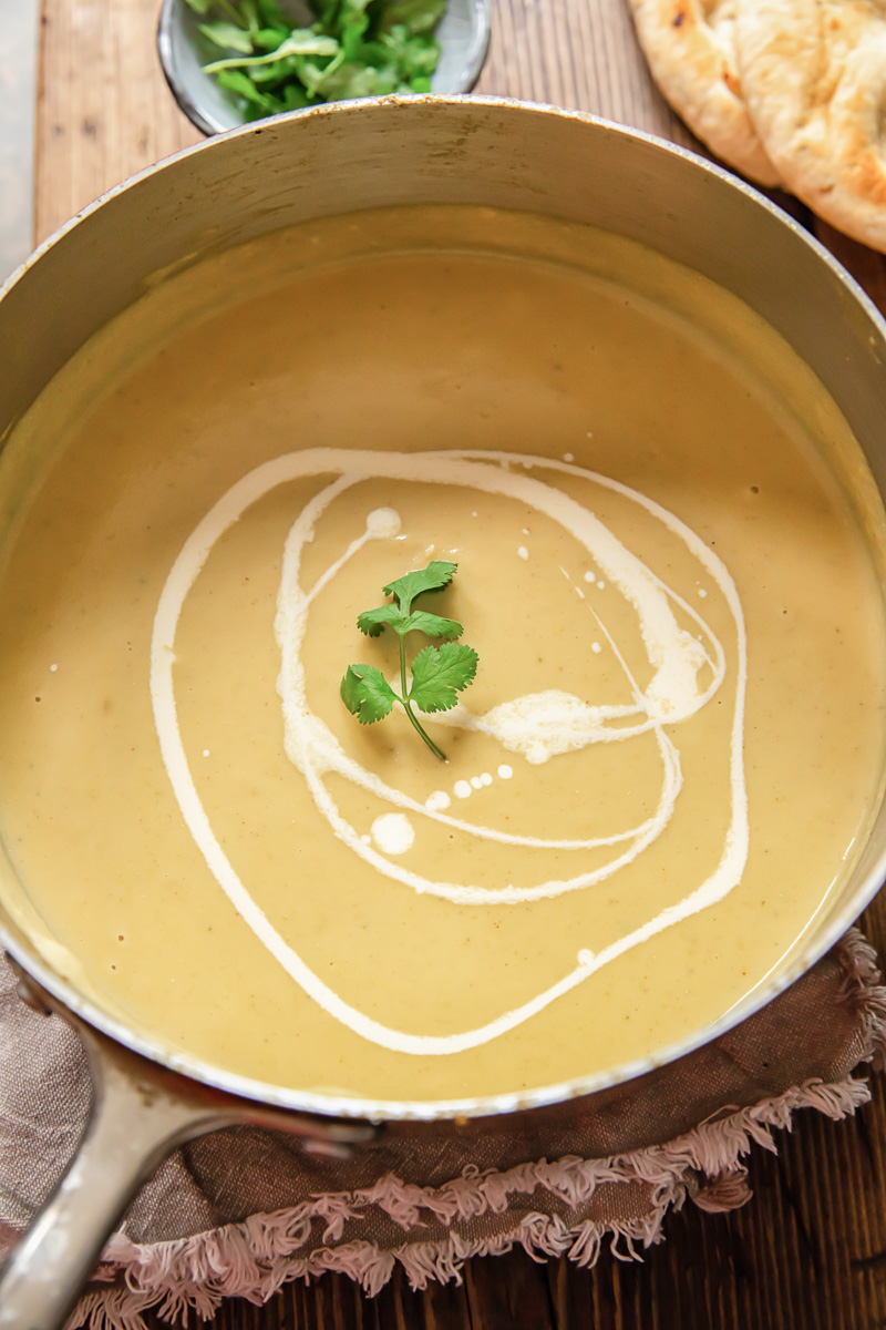 top down view of cauliflower soup in a pot