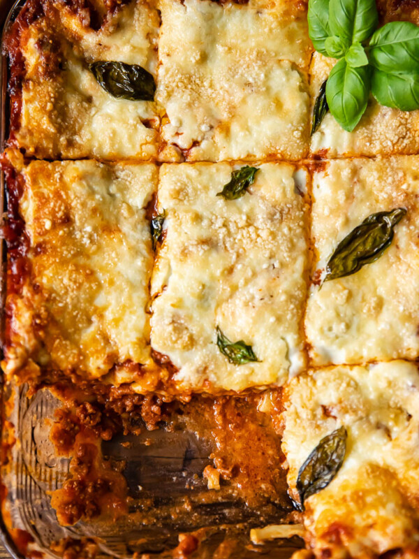 top down view of lasagne in a pan cut into squares