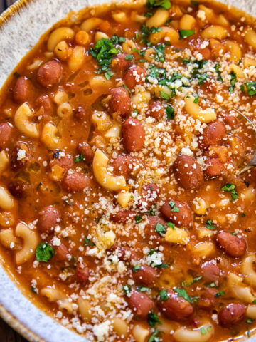 pasta and bean soup in a bowl
