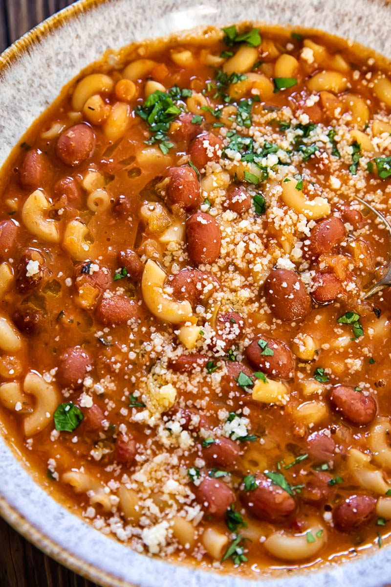 pasta and bean soup in a bowl