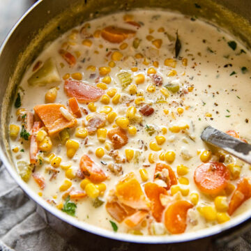 corn chowder with sweet potatoes in a soup pot