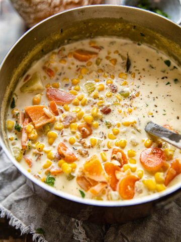 corn chowder with sweet potatoes in a soup pot