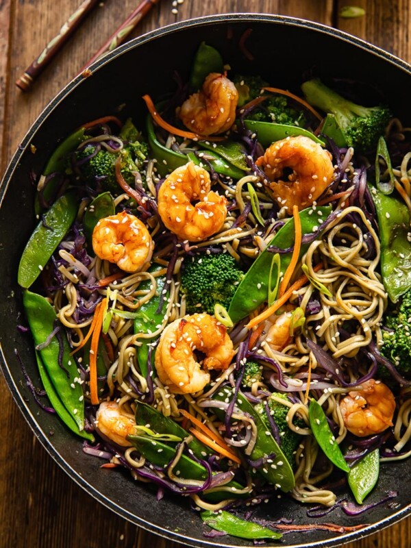 top down view of prawn noodle stir fry in a wok
