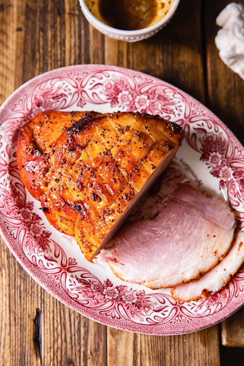 top down view of honey glazed ham on a platter