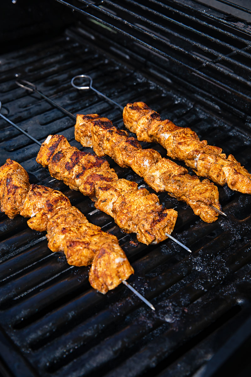 chicken skewers on the grill