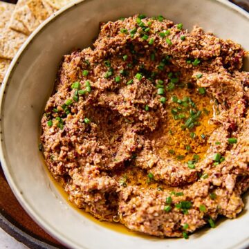 close up of tapenade in a grey bowl