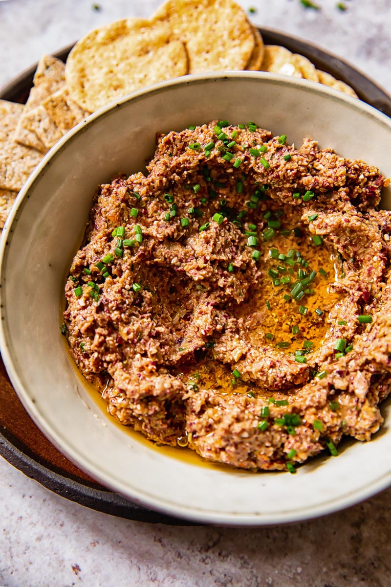 close up of tapenade in a grey bowl