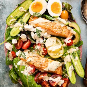 top down view of cob salad with salmon