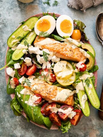 top down view of cob salad with salmon