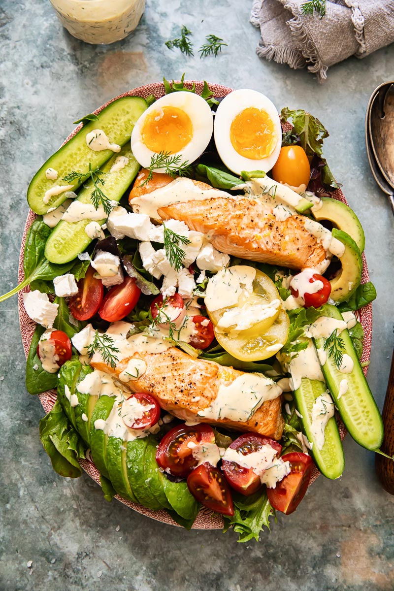top down view of cob salad with salmon