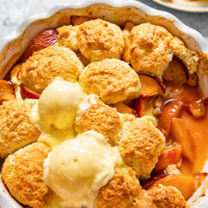 peach cobbler in a round pan