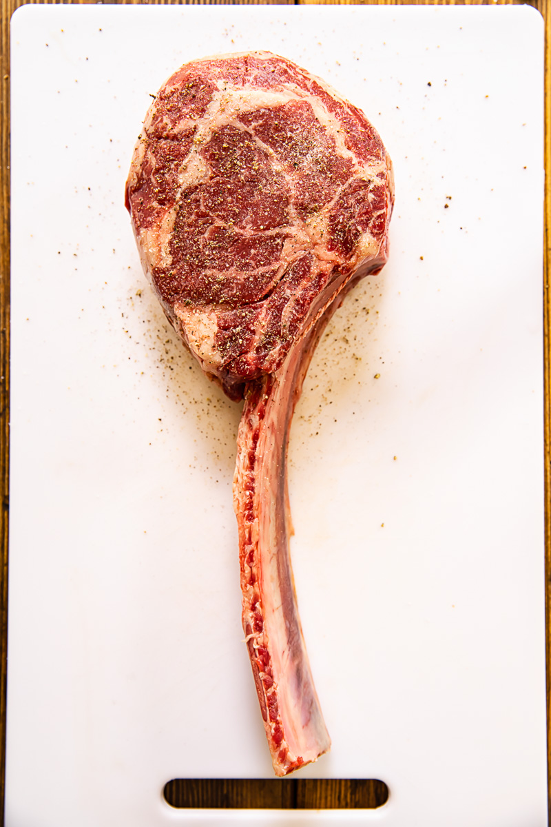 uncooked tomahawk steak