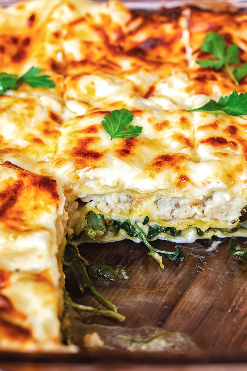 close up of chicken lasagna with layers exposed 