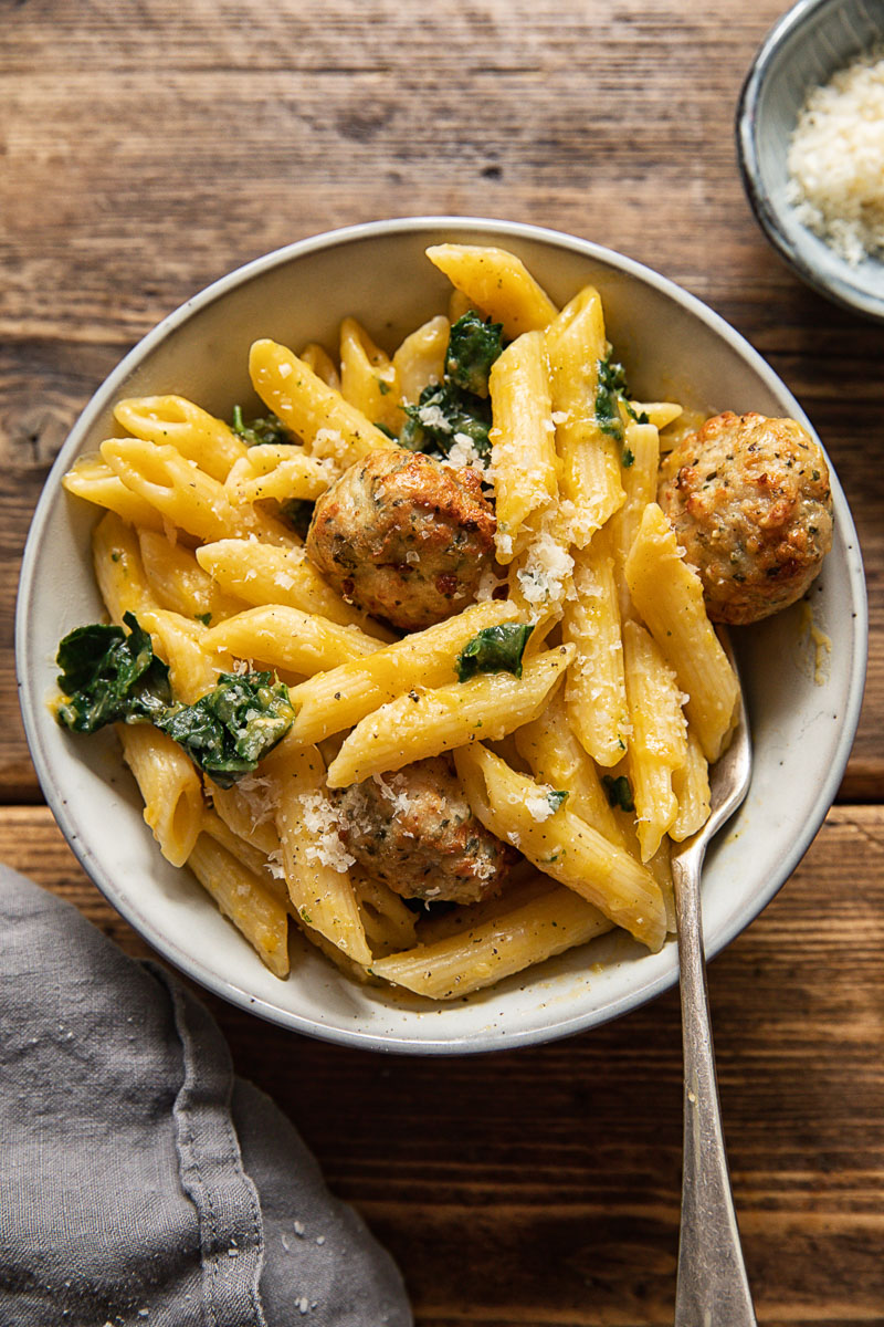 top down view with penne pasta and meatballs