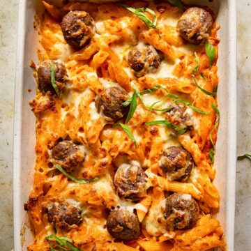 top down view of baked pasta with meatballs in a pan