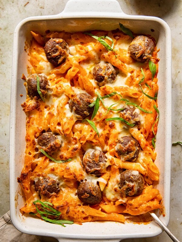 top down view of baked pasta with meatballs in a pan