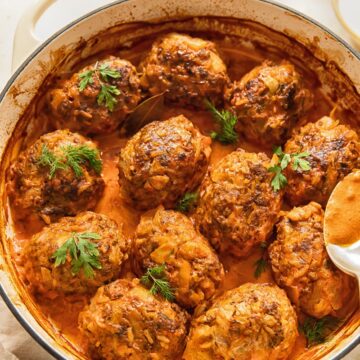 top down view of lazy cabbage rolls in tomato sauce in a white pan