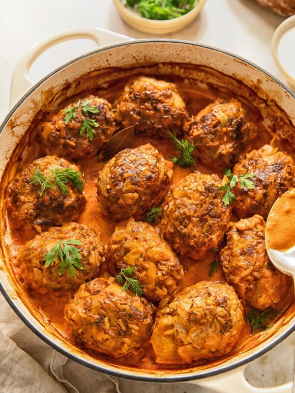 top down view of lazy cabbage rolls in tomato sauce in a white pan