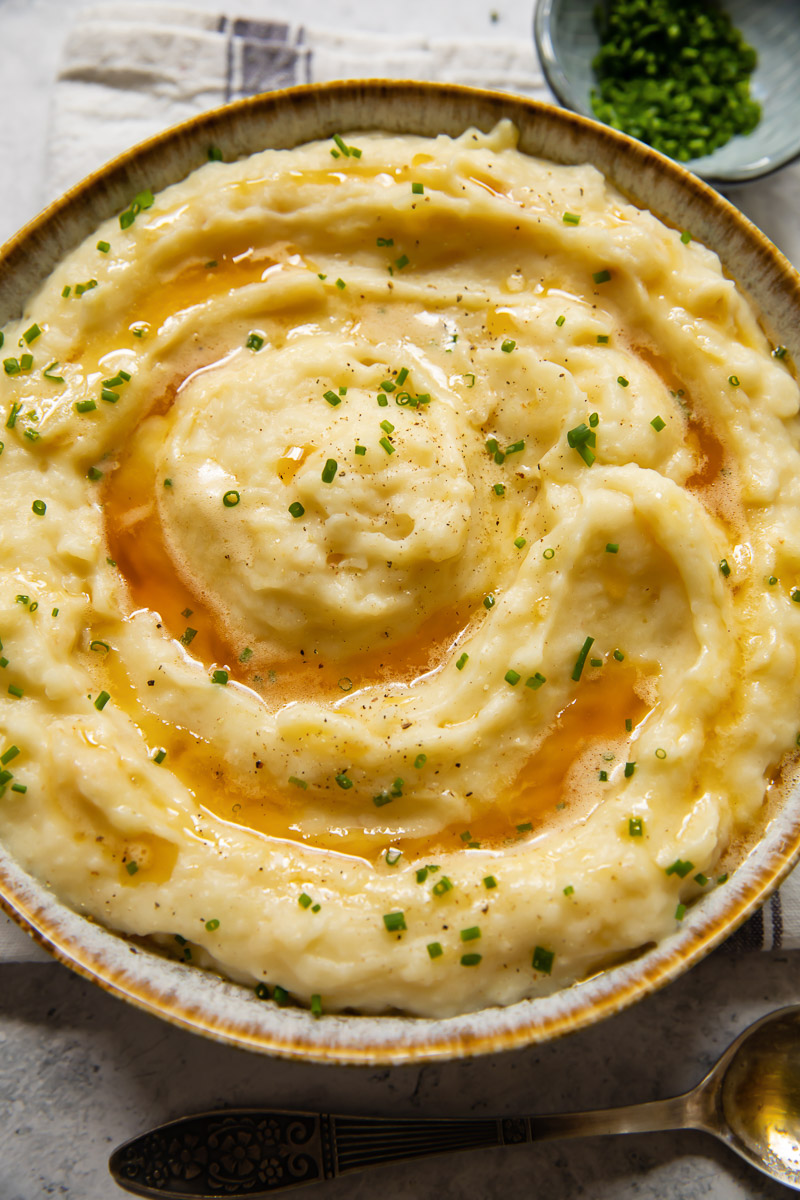 mashed celeriac and potatoes in a bowl