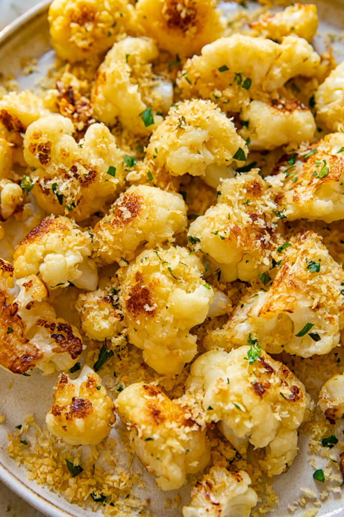 Close up of a plate of cauliflower and breadcrumbs