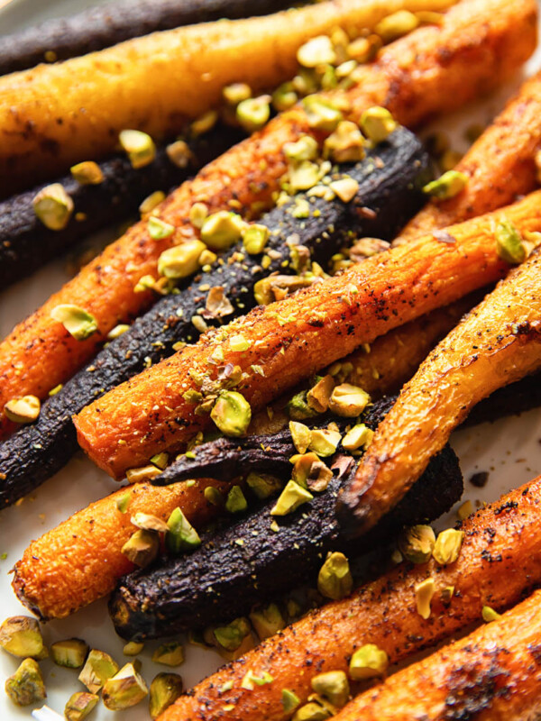 rainbow carrots sprinkles with pistachio nuts close up