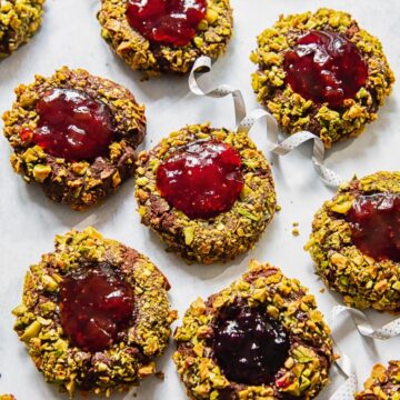 top down view of Christmas cookies filled with jam