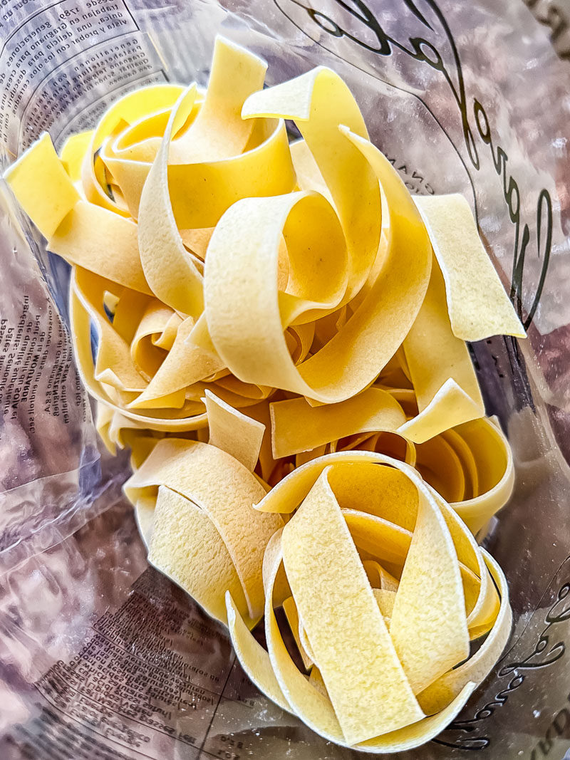 dried pappardelle paste in a plastic bag