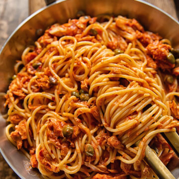 top down view of spaghetti in red sauce in a pan