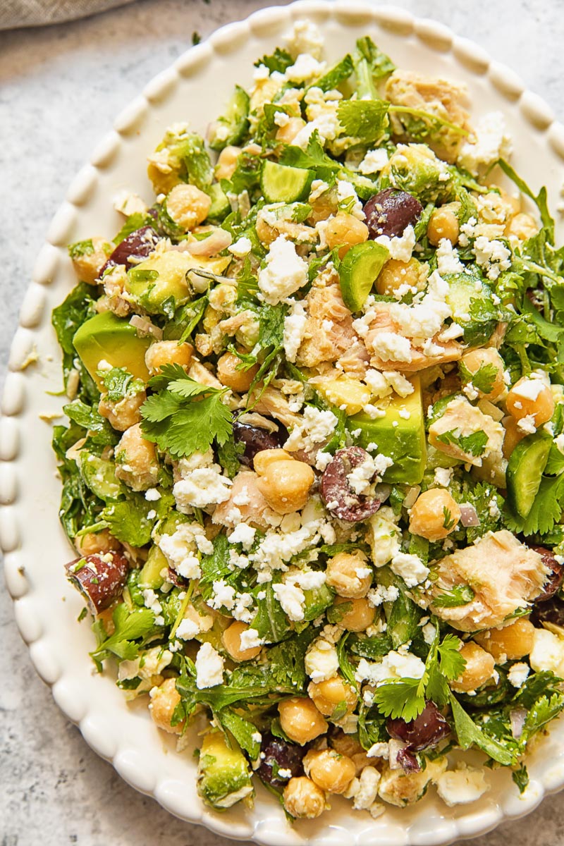 top down view of a salad on white serving platter