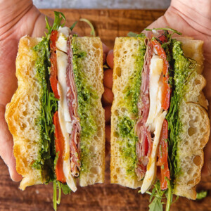 cross section of focaccia sandwich with deli meats and cheese