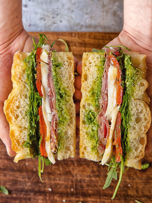 cross section of focaccia sandwich with deli meats and cheese