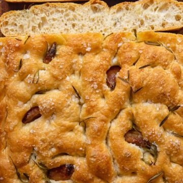 focaccia bread with a few slices cut