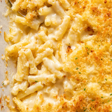 Close up view of truffle mac and cheese in a baking dish.