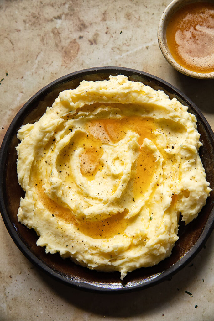 Top down of a plate of mashed potatoes