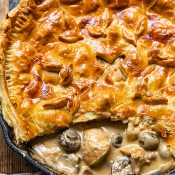 Chicken and mushroom pie with one slice removed