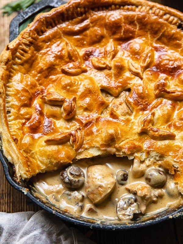 Chicken and mushroom pie with one slice removed