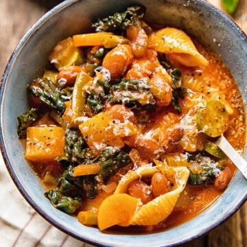 Bowl of minestrone soup with a spoon