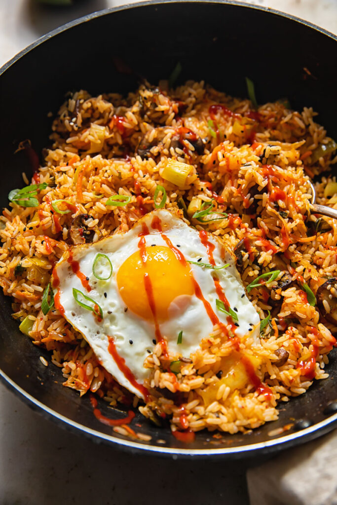 Wok with kimchi fried rice and a fried egg