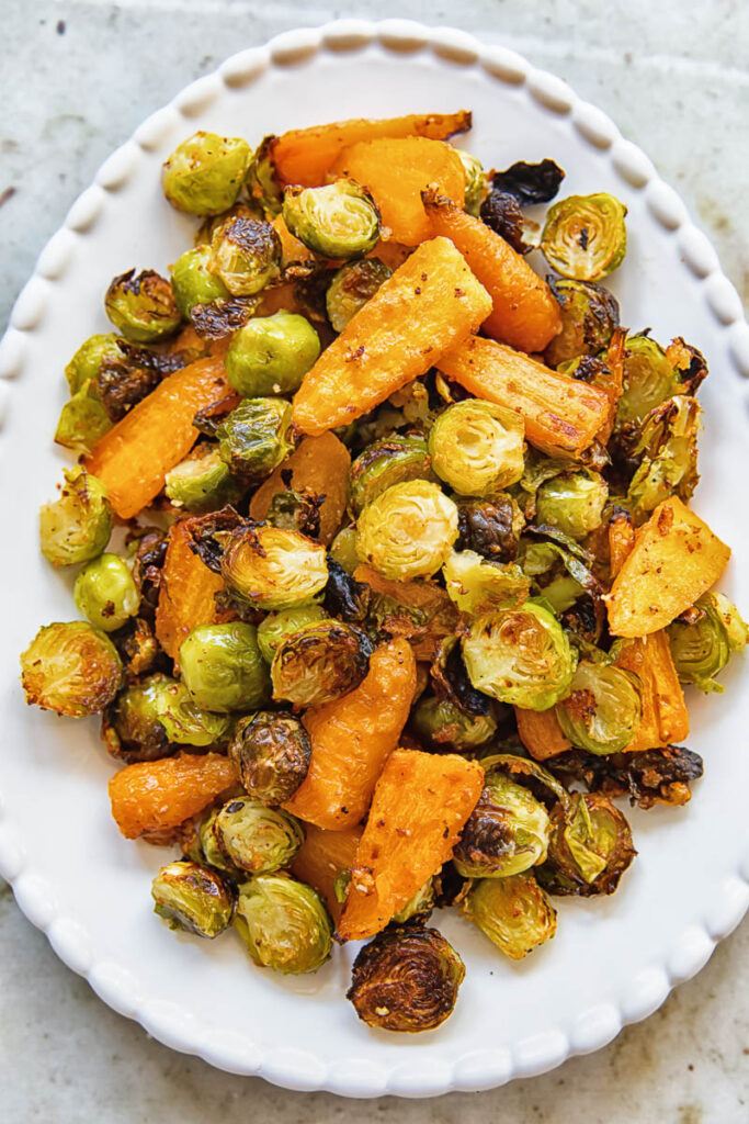 serving plate with roasted brussels sprouts and carrots