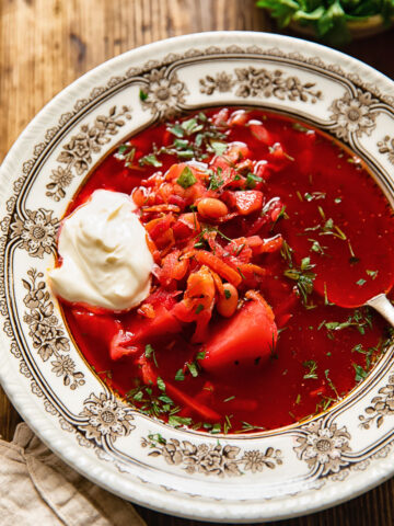 bowl of vegetarian borscht with sour cream