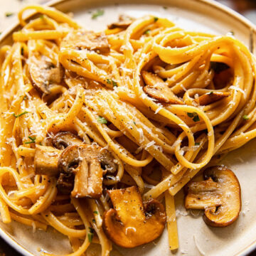 Side shot of vegetarian mushroom carbonara on a plate